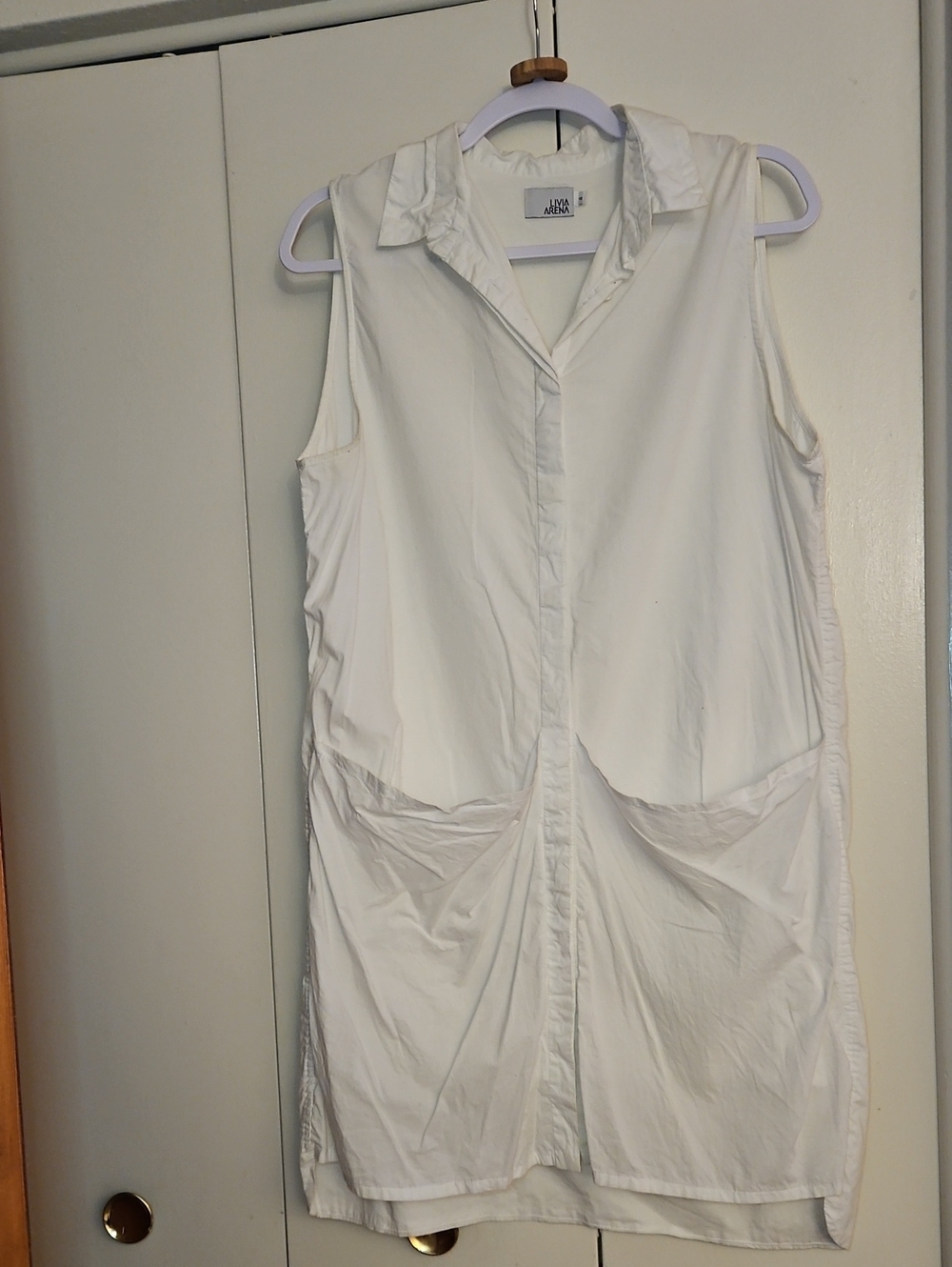 Livia Arena Sleeveless White Button-Front Tunic with Faux Front Pockets
